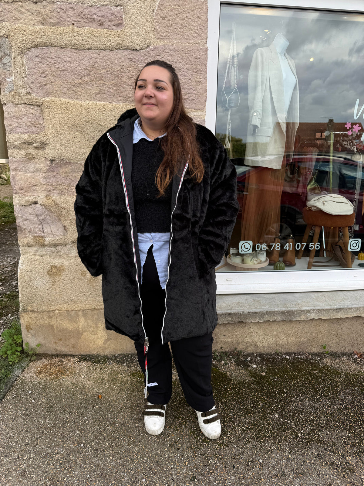 Parka noire fourrée